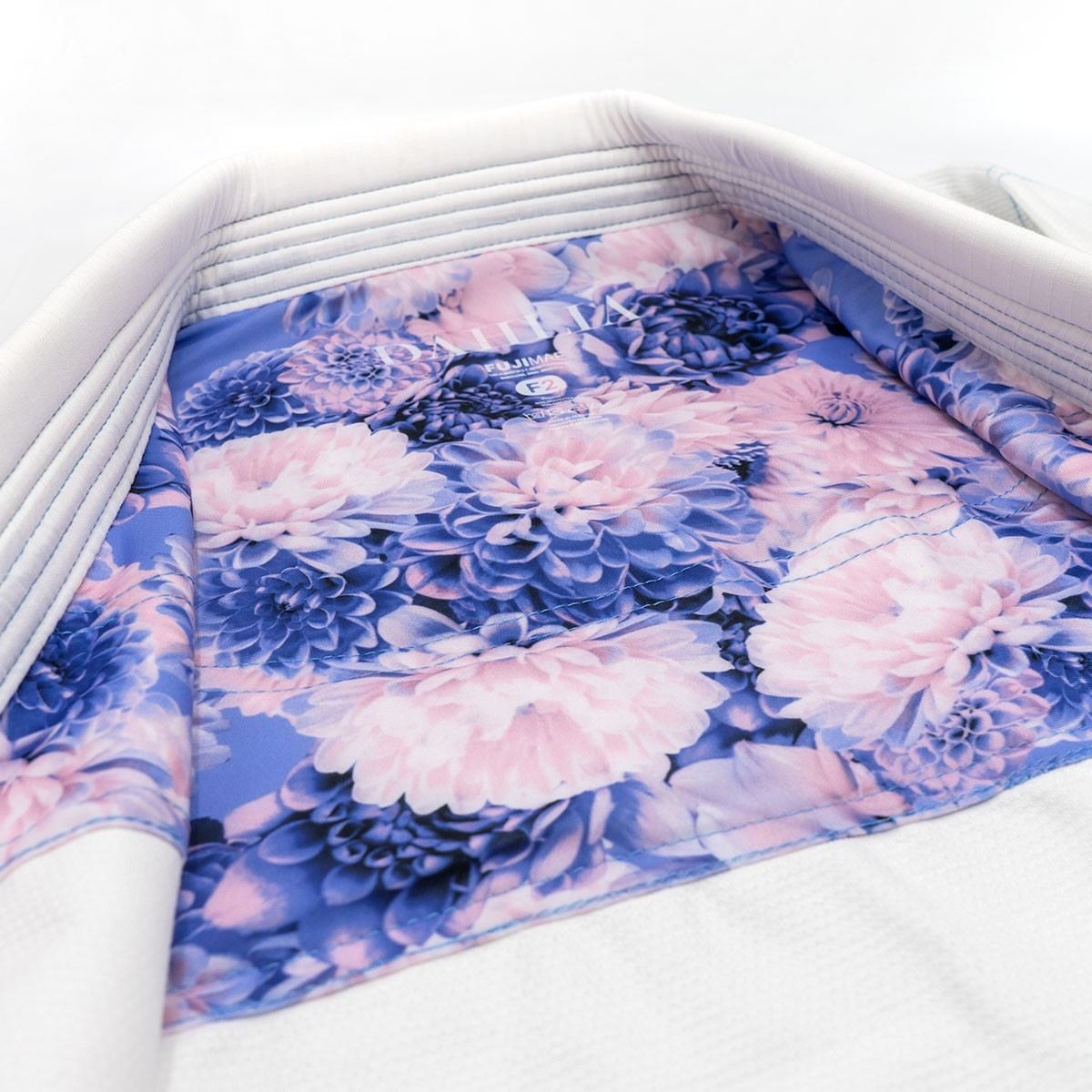 Interior floral lining of white and blue Kimono BJJ Gi Dahlia FUJIMAE women's Brazilian Jiu Jitsu uniform