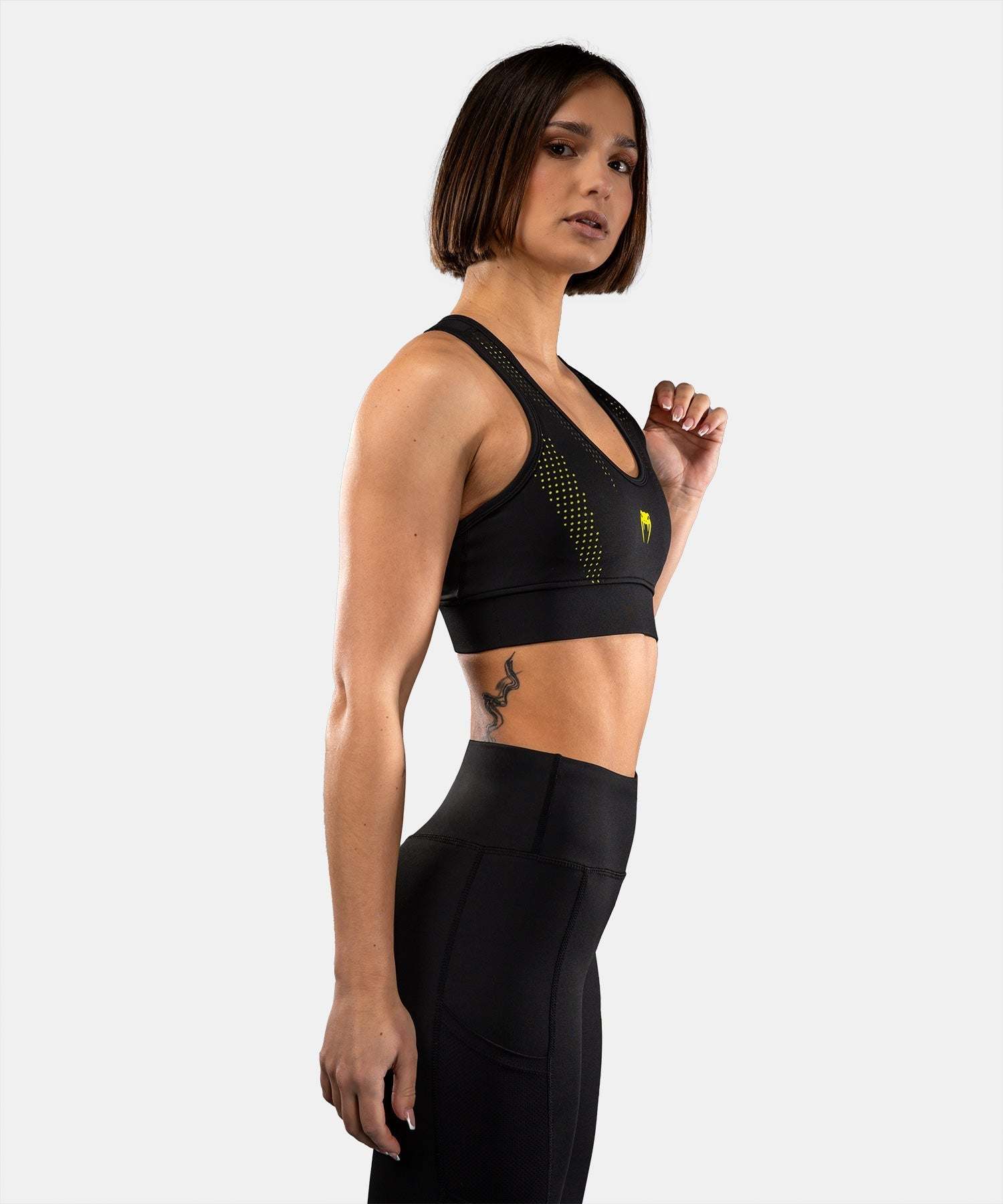 Brassière de sport Venum Lazer noir et jaune, maintien stable et confort pour entraînement intensif