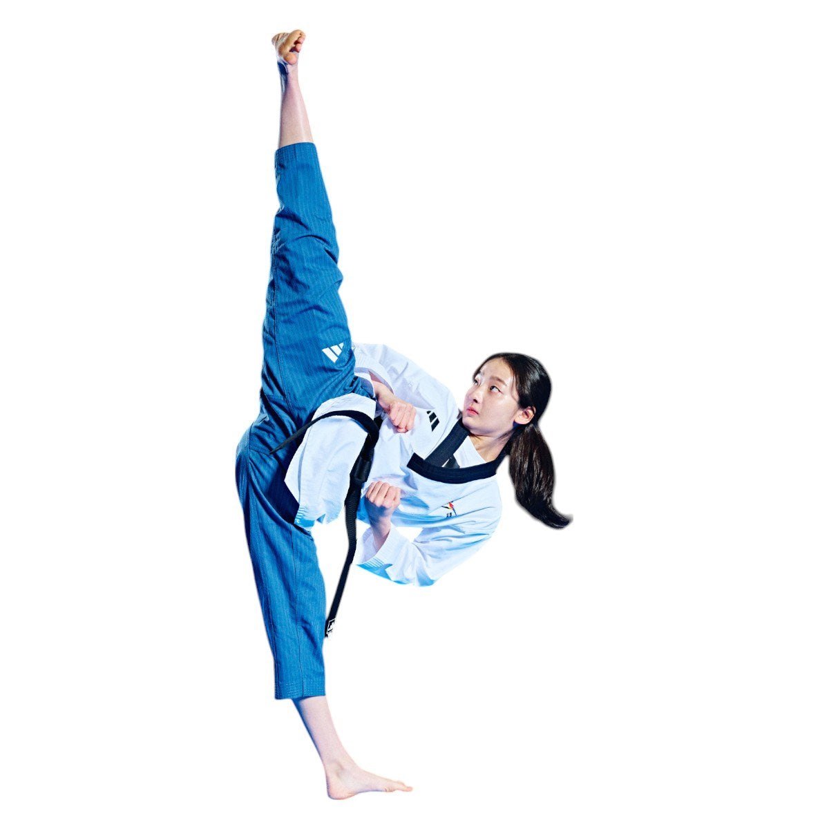 Female athlete wearing adidas Dobok Taekwondo Poomsae uniform performing high kick against white background