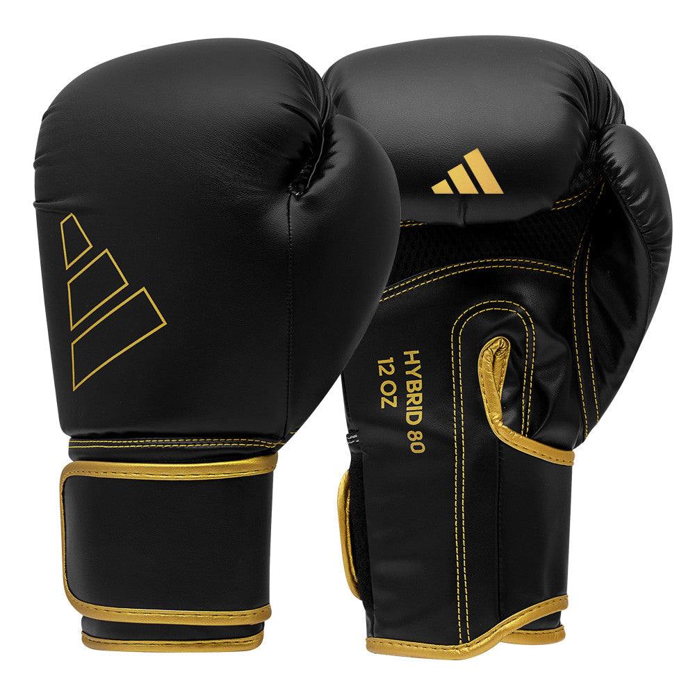 Black and gold Adidas Hybrid 80 boxing gloves with PU material and secure Velcro closure