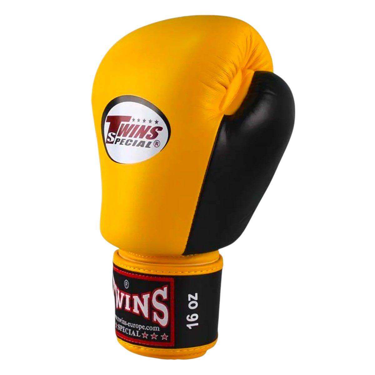 Yellow and black Twins Classic boxing glove made of premium Thai buffalo leather with 16 oz size and multi-layer high-density foam for optimal hand protection.