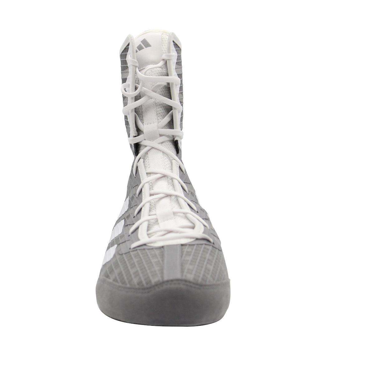 Front view of grey and white Adidas Box Hog IV boxing shoe with high ankle support and laces designed for performance and comfort