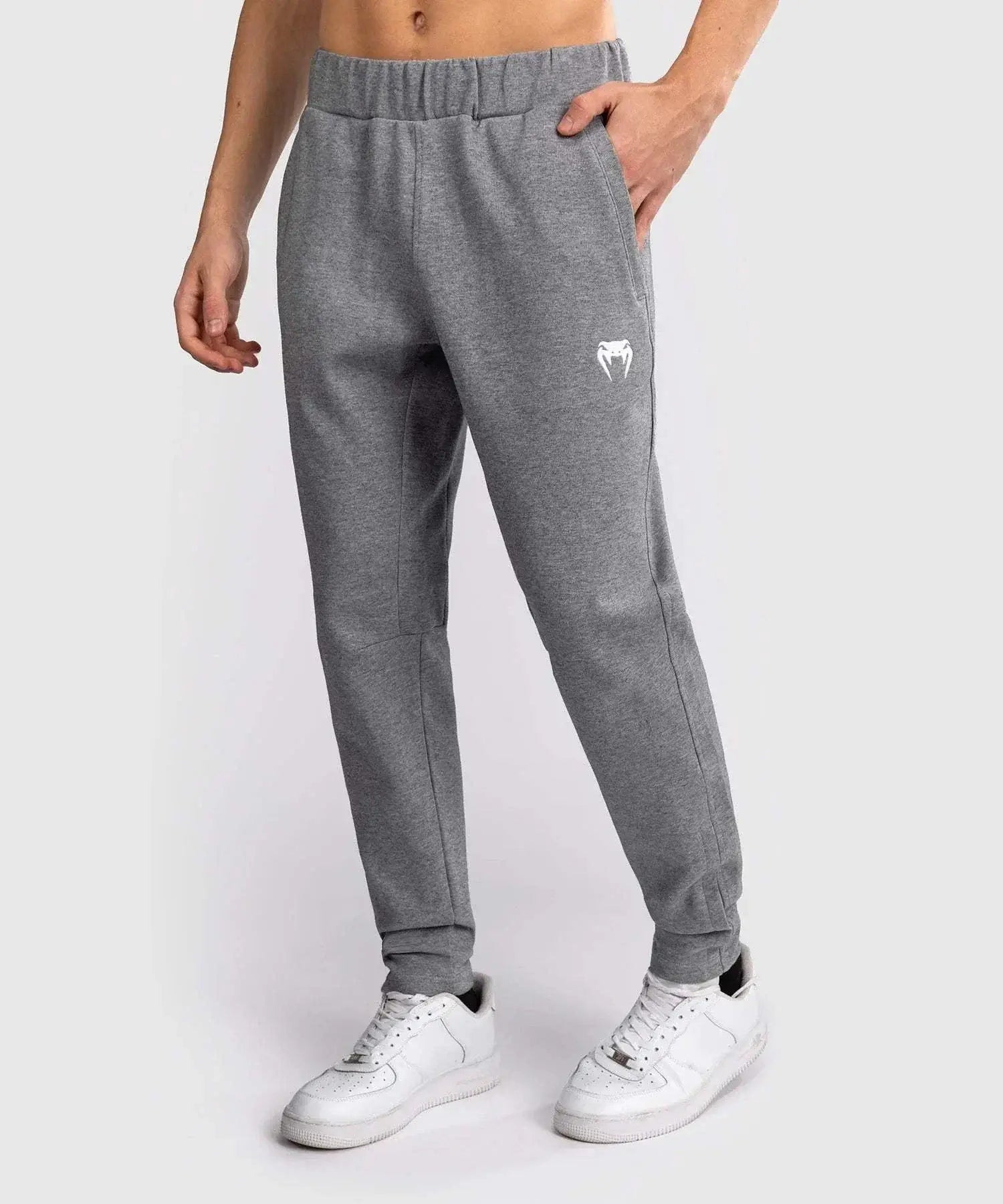Grey Venum City Core jogging pants with elastic waistband and logo on thigh