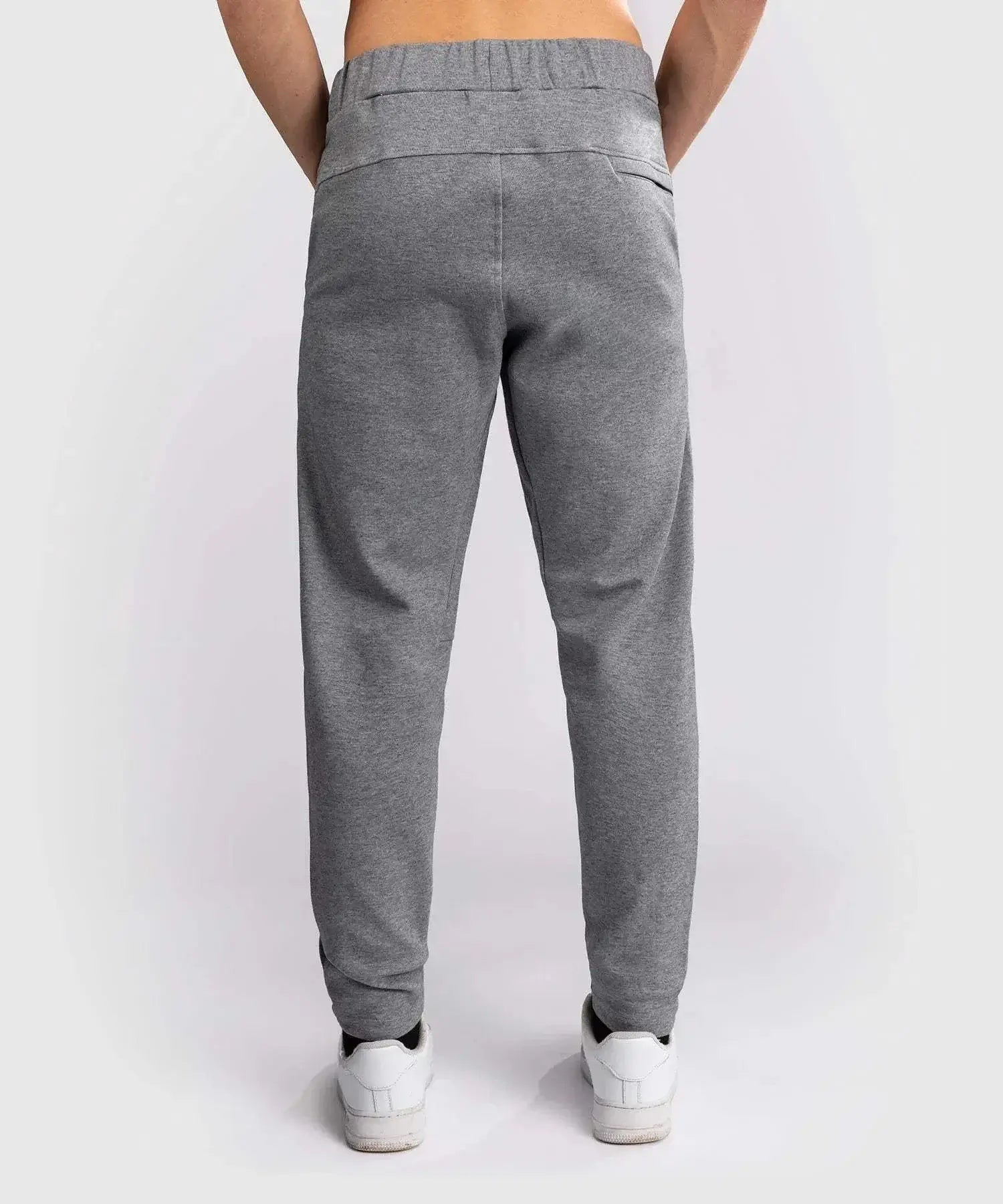 Back view of grey Jogging Venum City Core athletic pants with elastic waistband and fitted cuffs
