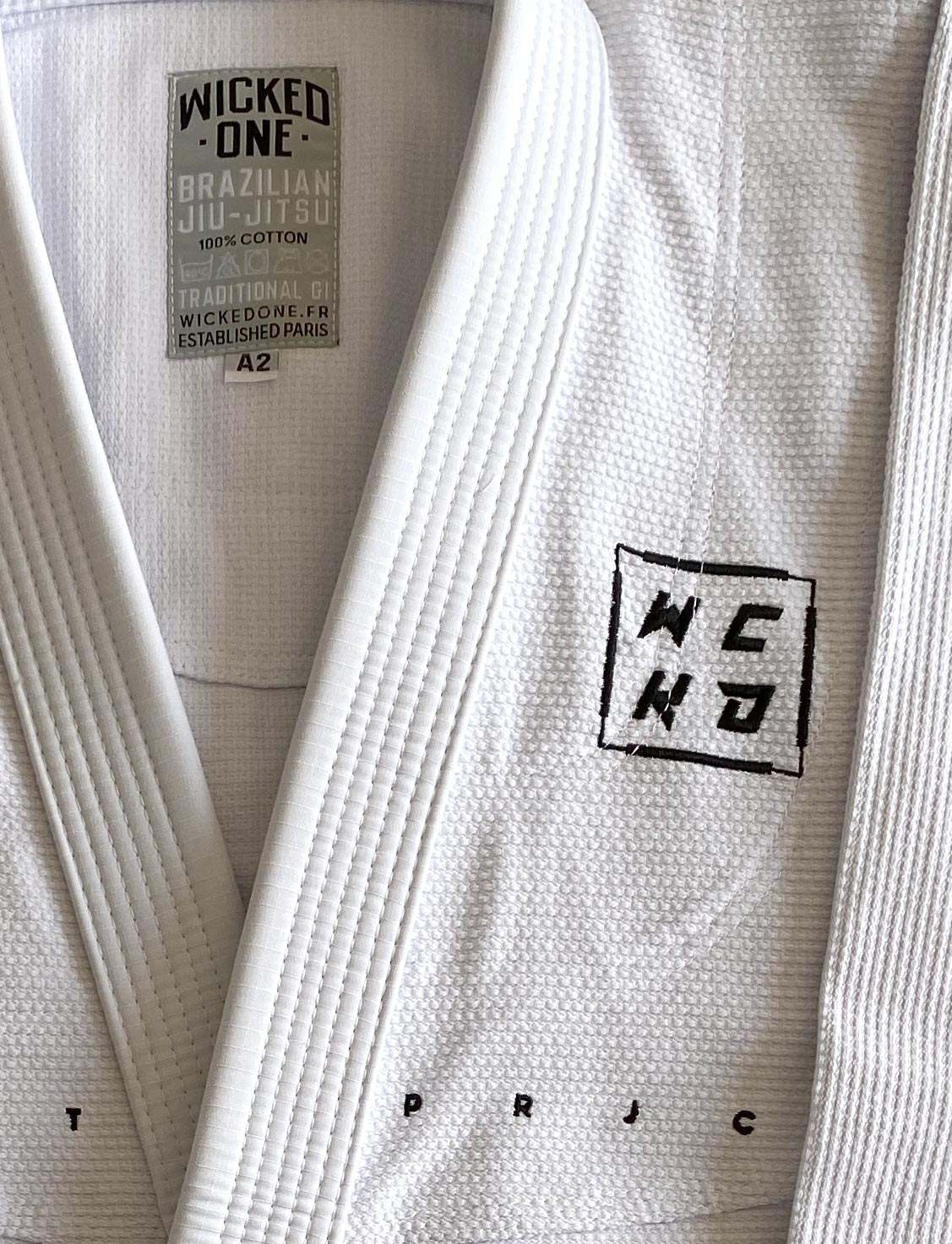 Kimono de JJB blanc Wicked One GI SCORE, performance et durabilité pour entraînement et compétition