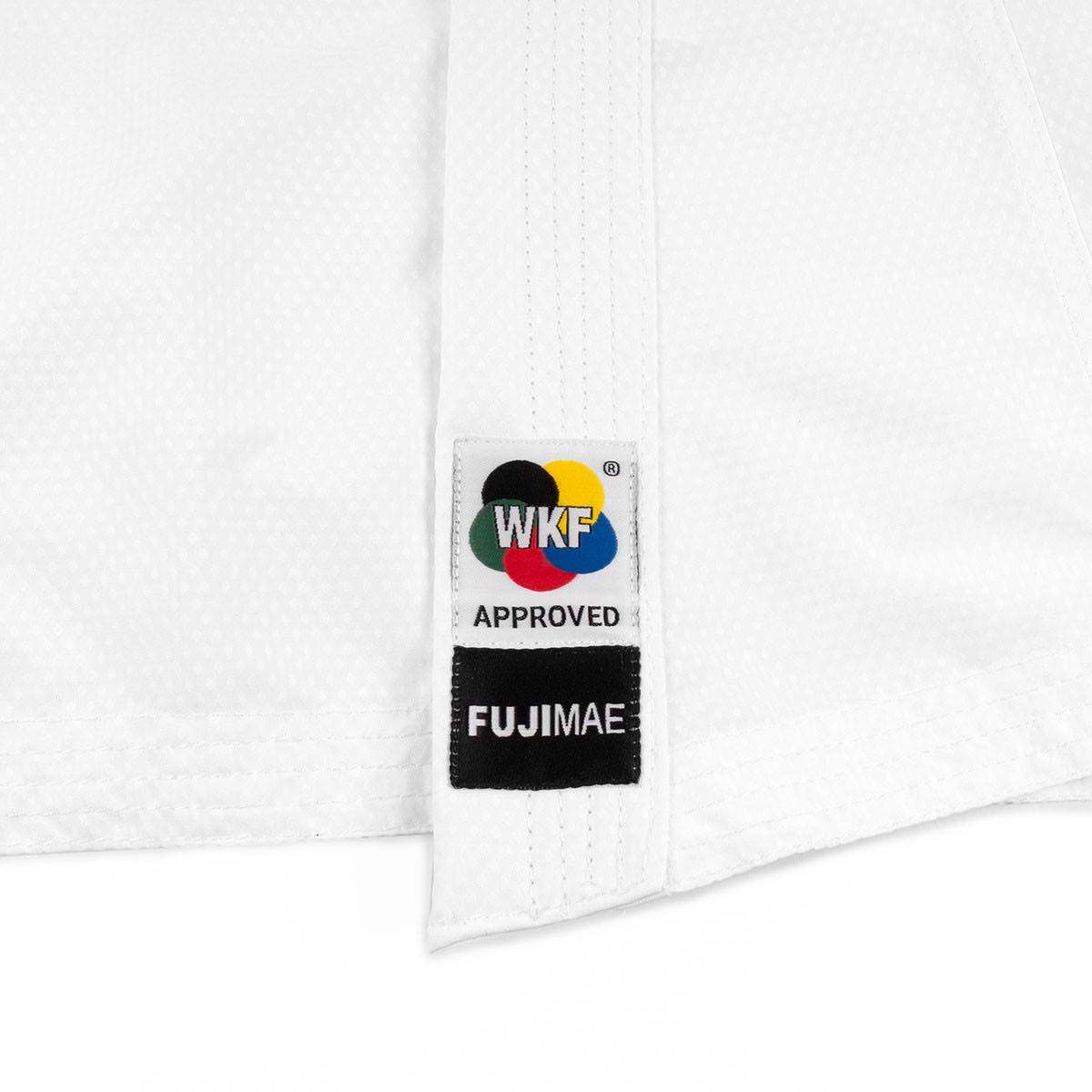 White lightweight Karaté Combat FUJIMAE karate gi with WKF approved patch and breathable fabric for training and competition.
