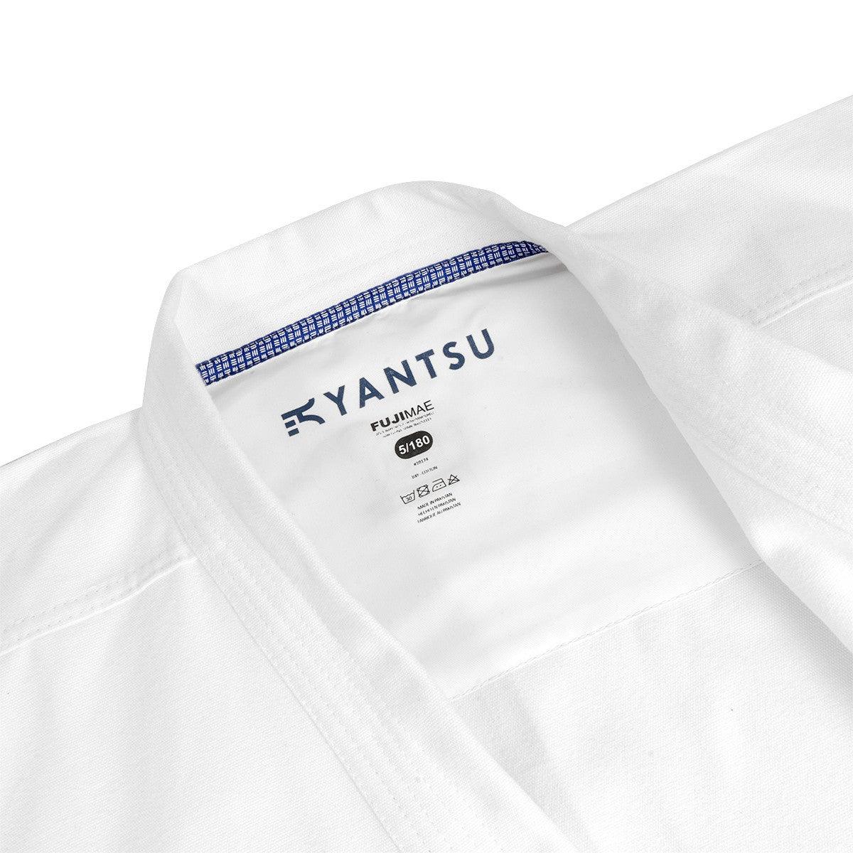 Shinkyokushin Yantsu Karate Gi white cotton jacket with blue patterned inner collar and printed branding tags