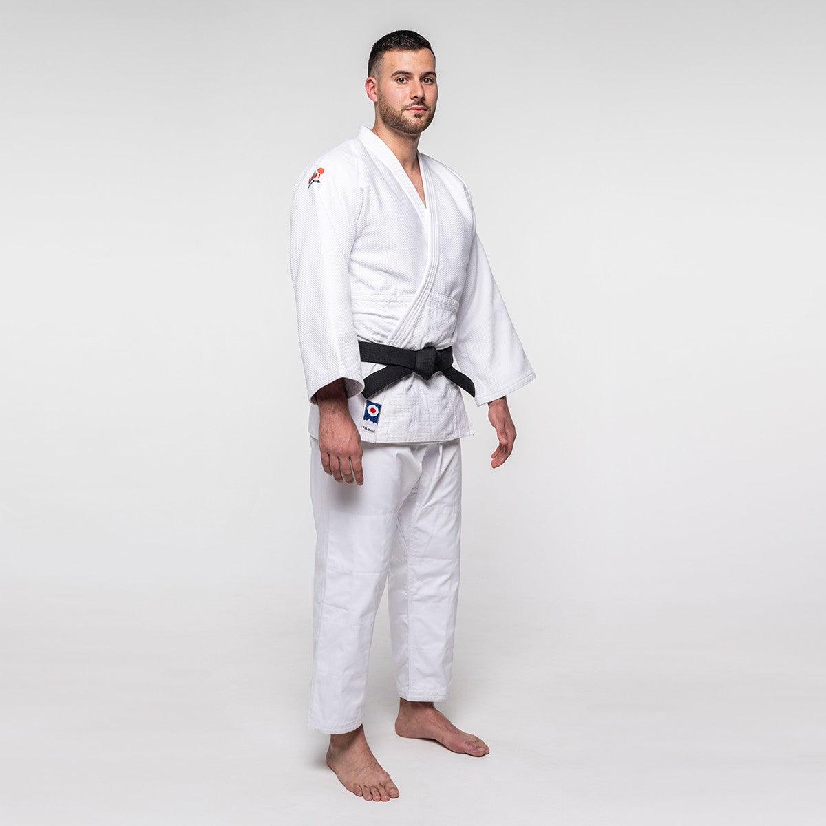 Male wearing white Judo Gi ProWear 2 competition uniform with black belt standing against plain background