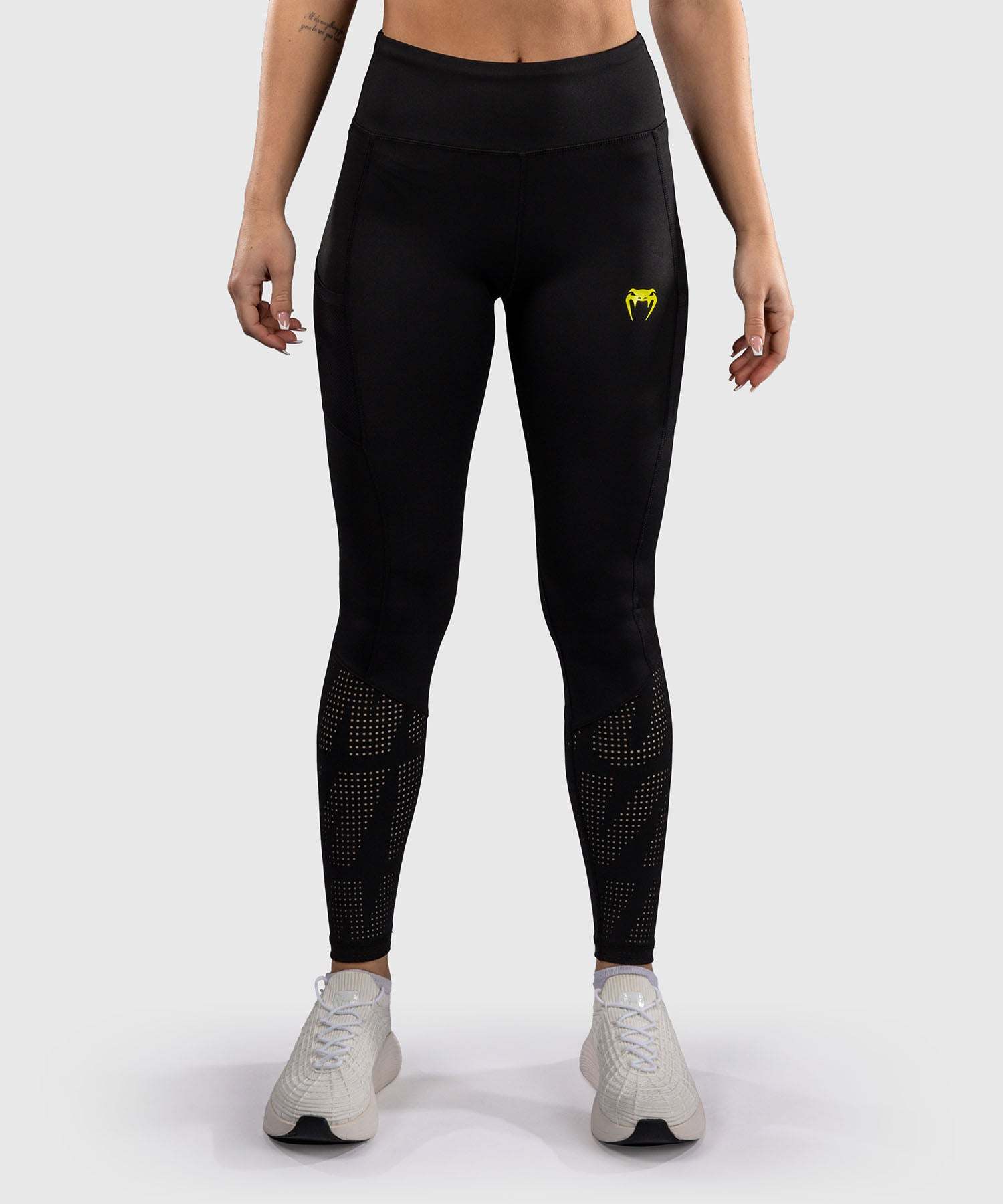 Legging Venum Lazer noir jaune femme pour entraînement MMA et grappling avec compression et maintien musculaire