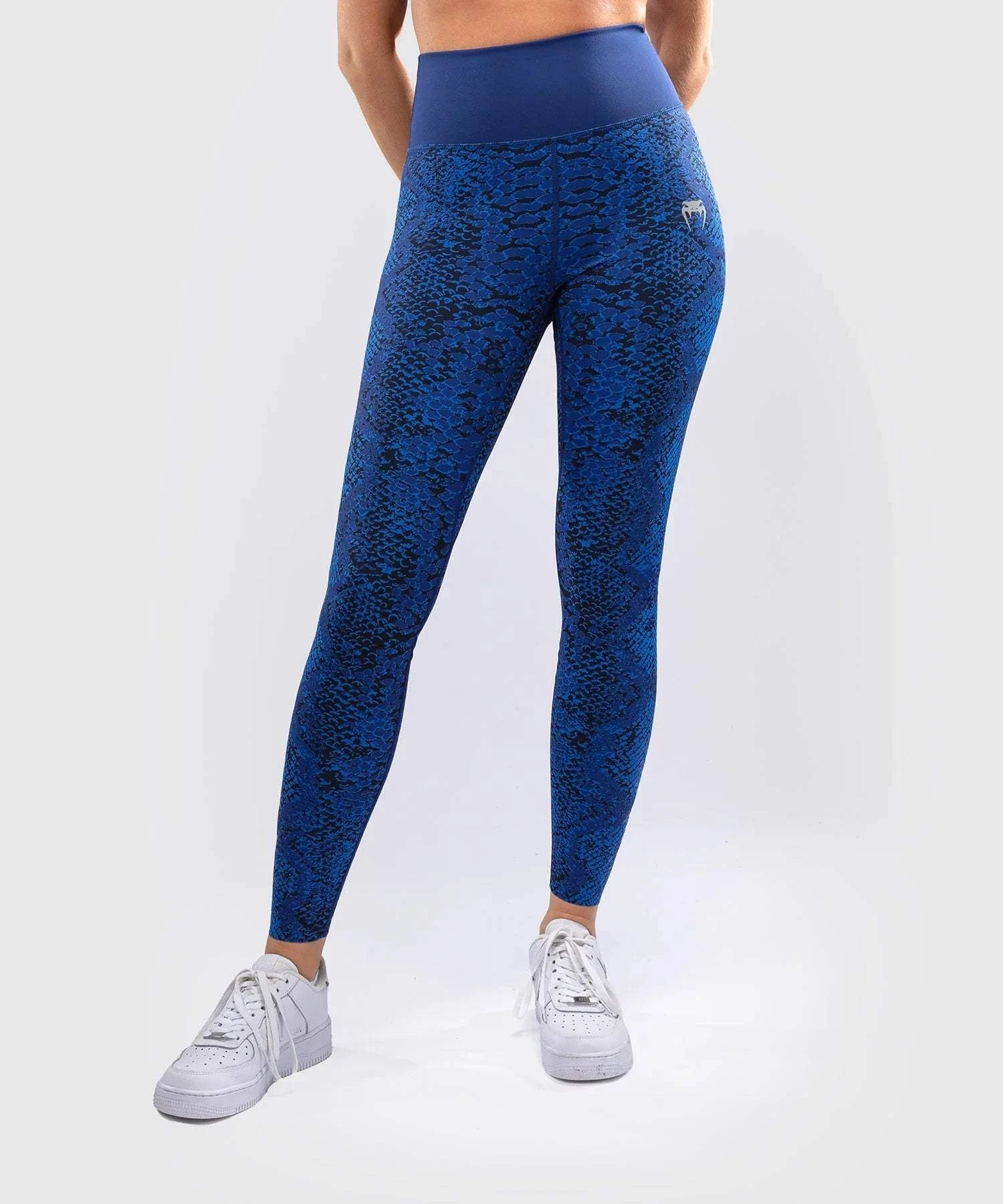 Women's long Venum Amazonia leggings in ultramarine blue with snake skin pattern and high waist support for fitness and combat sports