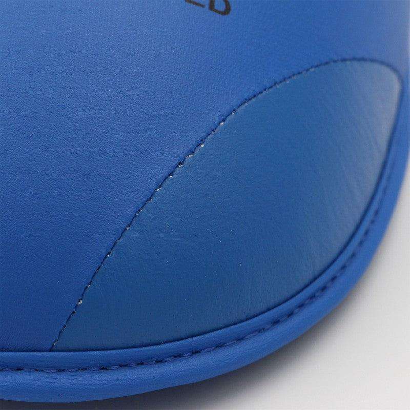 Close-up of blue Adidas Protège-Tibias et Pieds Karate shin and foot guard with durable PU material and reinforced stitching detail
