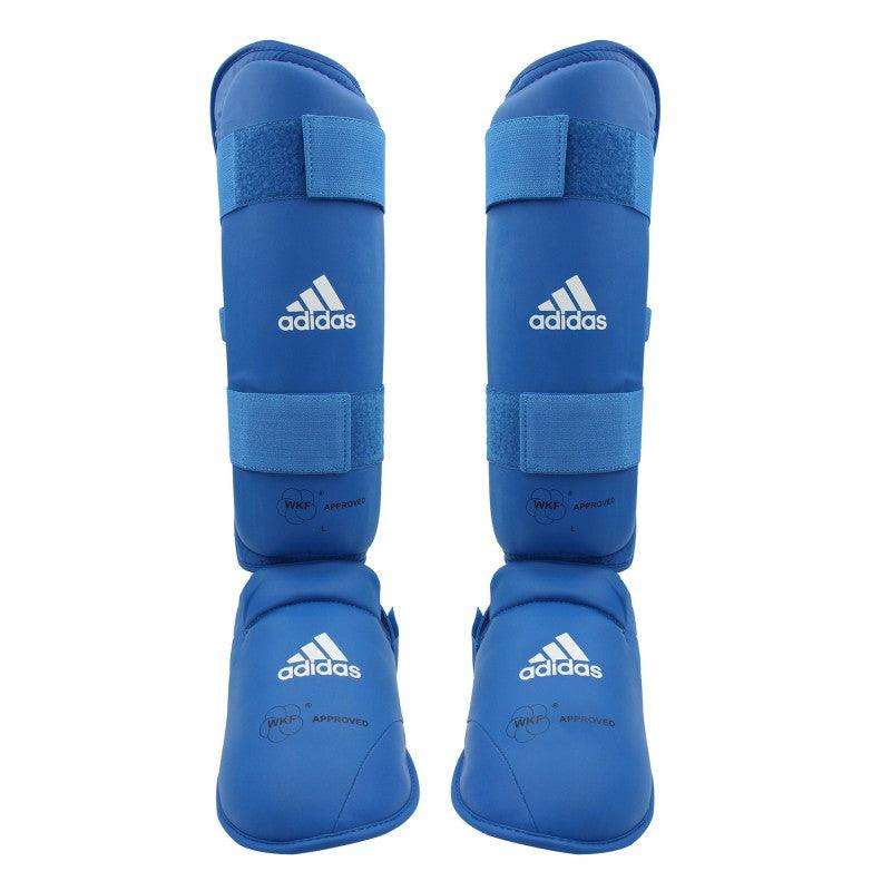 Blue Adidas WKF approved karate shin and foot protectors with adjustable straps for safety and performance