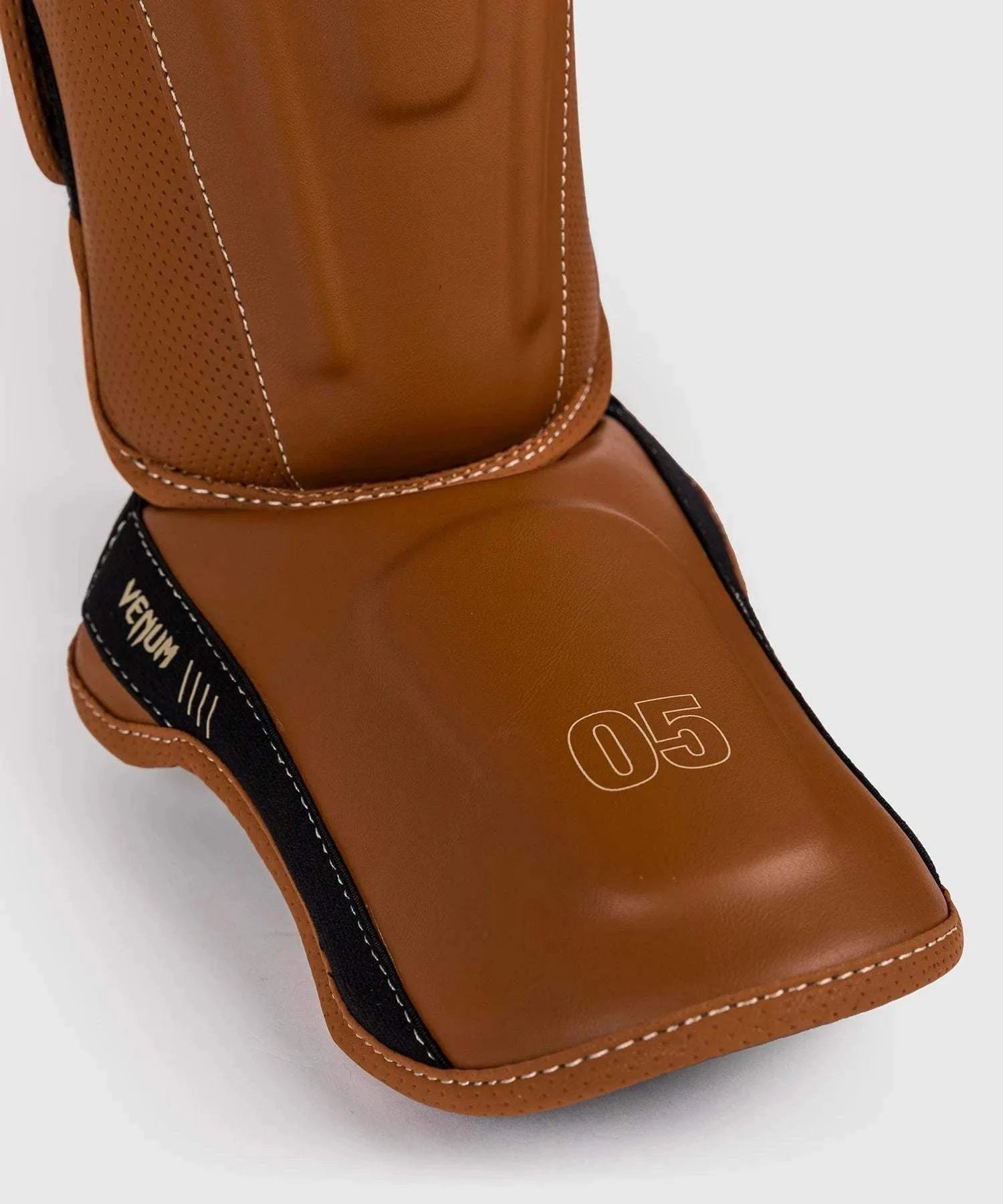 Protège-tibias Venum Impact Evo - Havana - Protection et Confort Ultime