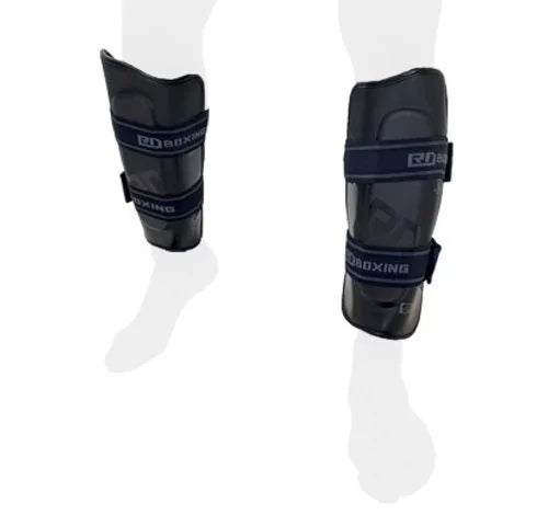 High-density RD BOXING black shin guards with dual velcro straps for intense training and sparring protection