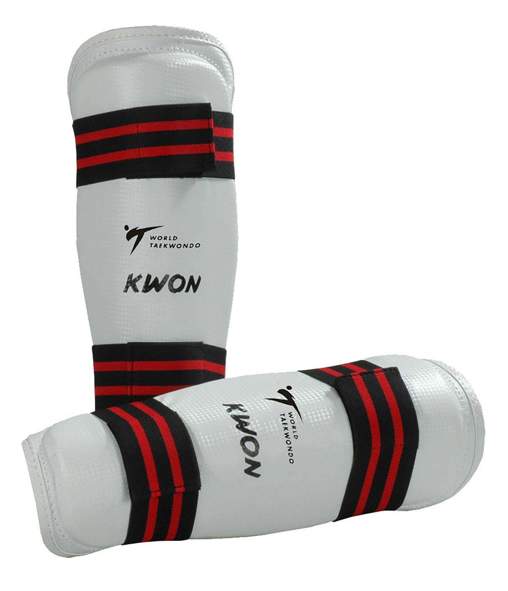 White and black Kwon Protege-tibias shin guards with red stripes for Taekwondo training and competition, WT approved