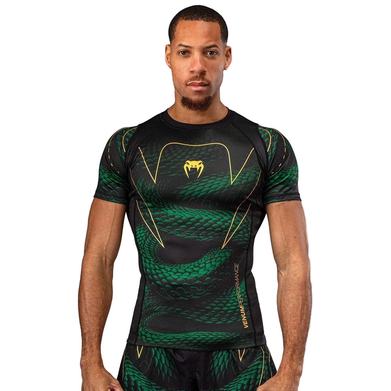 Rashguard manches courtes Venum Matupa noir vert or pour grappling et MMA, maintien musculaire et protection contre les frottements