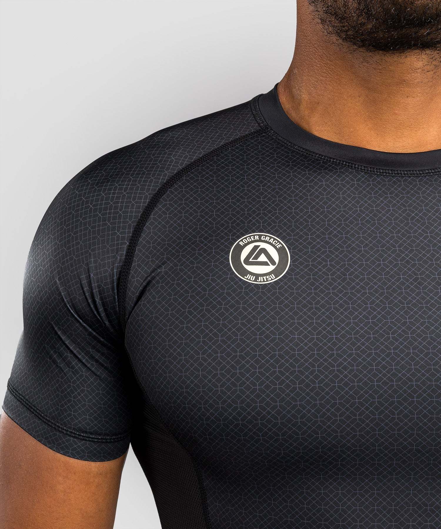 Rashguard manches courtes Venum x Roger Gracie Academy noir pour BJJ et grappling, coupe compressive et respirante