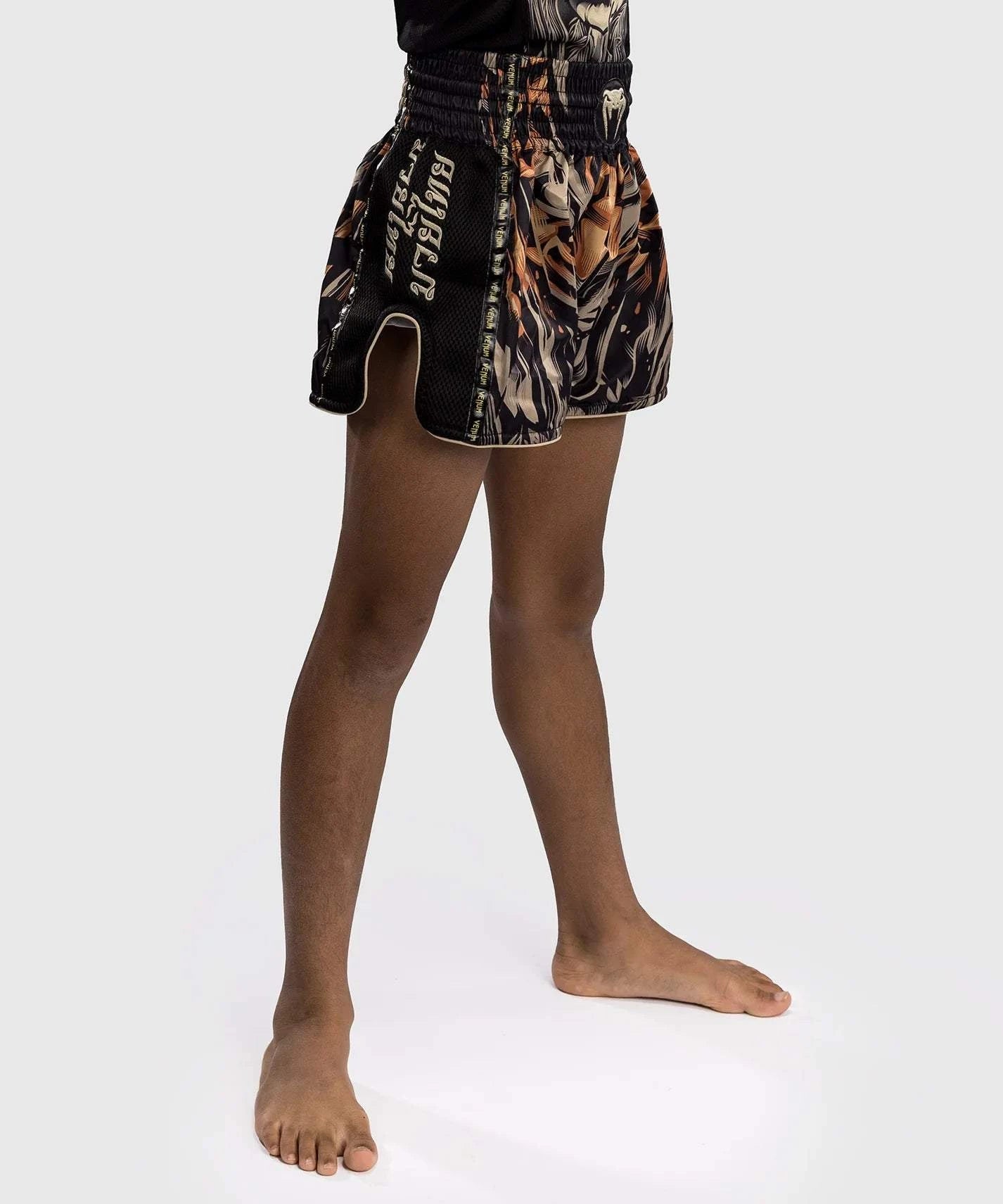 Short Muay Thai Venum enfant Tiger - Noir/Orange Néon