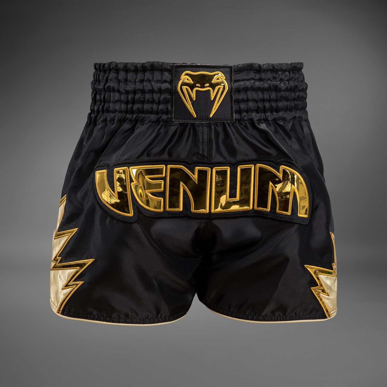 Short de Muay Thaï Venum Inferno noir et or léger et flexible pour entraînement et combat