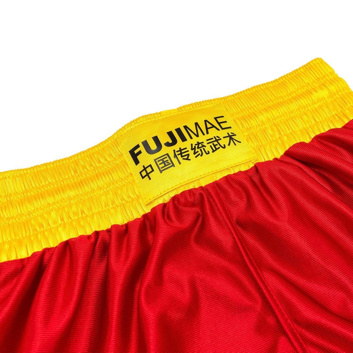 Red and yellow FUJIMAE Sanda training shorts with elastic waistband and traditional design