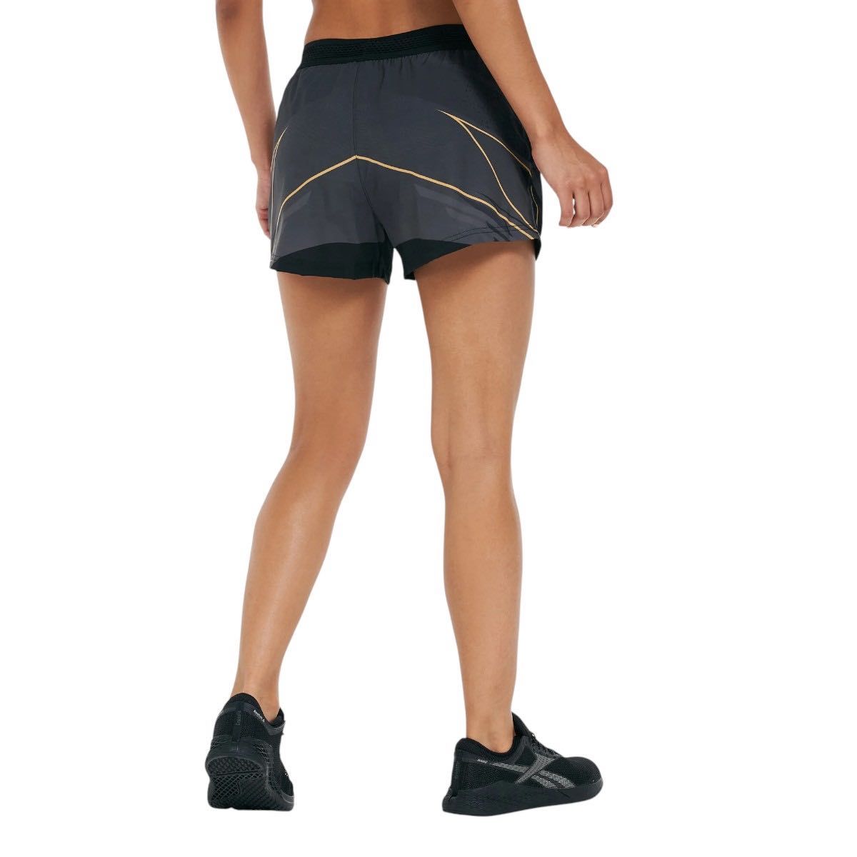 Women's black and gold UFC Venum Replica Champion sports shorts, lightweight and breathable for optimal movement and moisture control