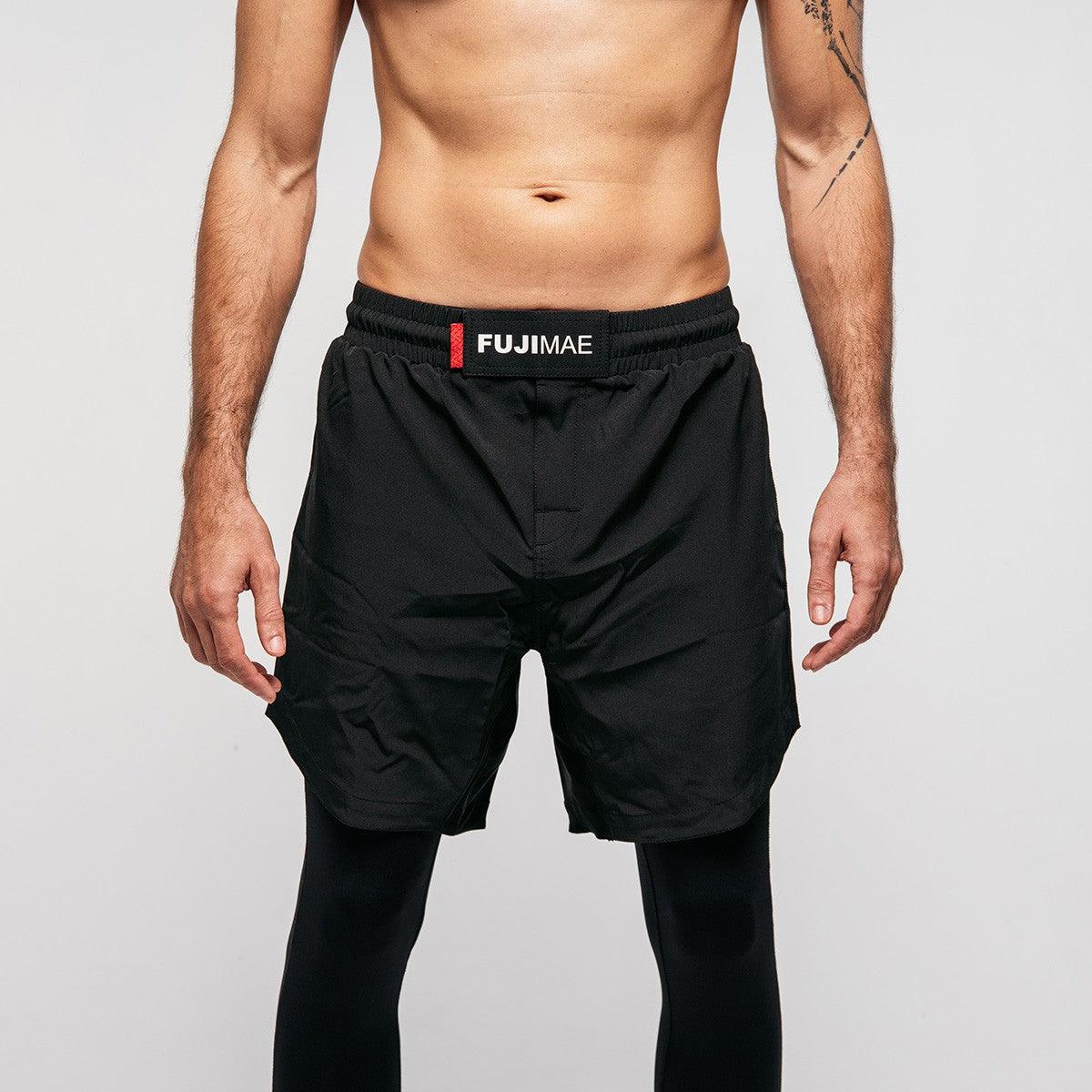 Black FUJIMAE No Gi training shorts for Brazilian Jiu Jitsu with elastic fabric and side openings