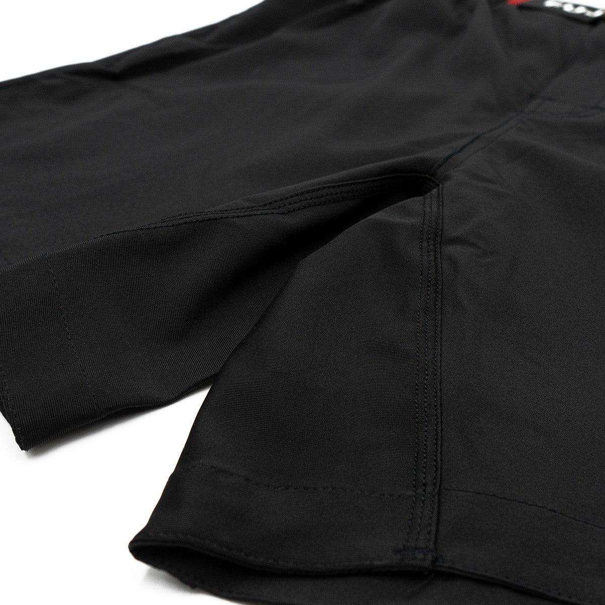 Black ultralight No Gi training shorts for Brazilian Jiu Jitsu with reinforced seams and side openings for mobility