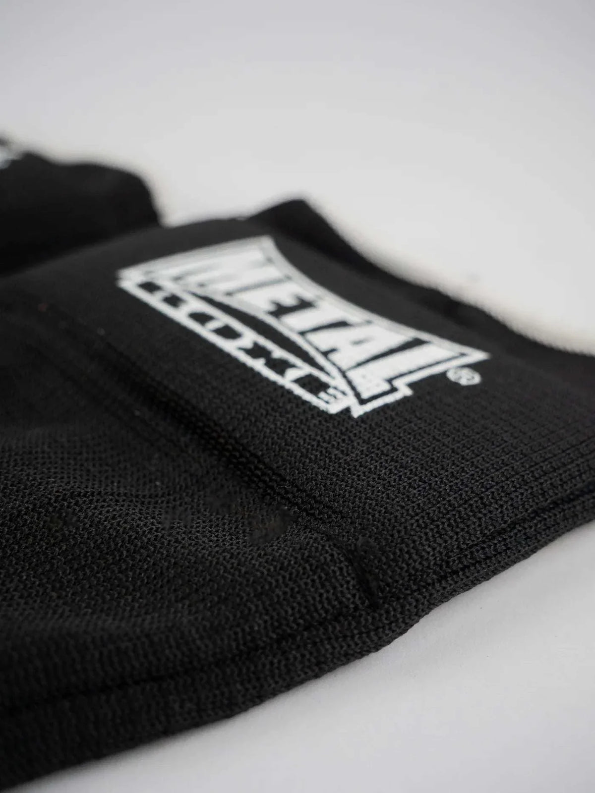 Sous-gant Max Gel éponge noir avec gel métacarpes et velcro pour protection en boxe et MMA