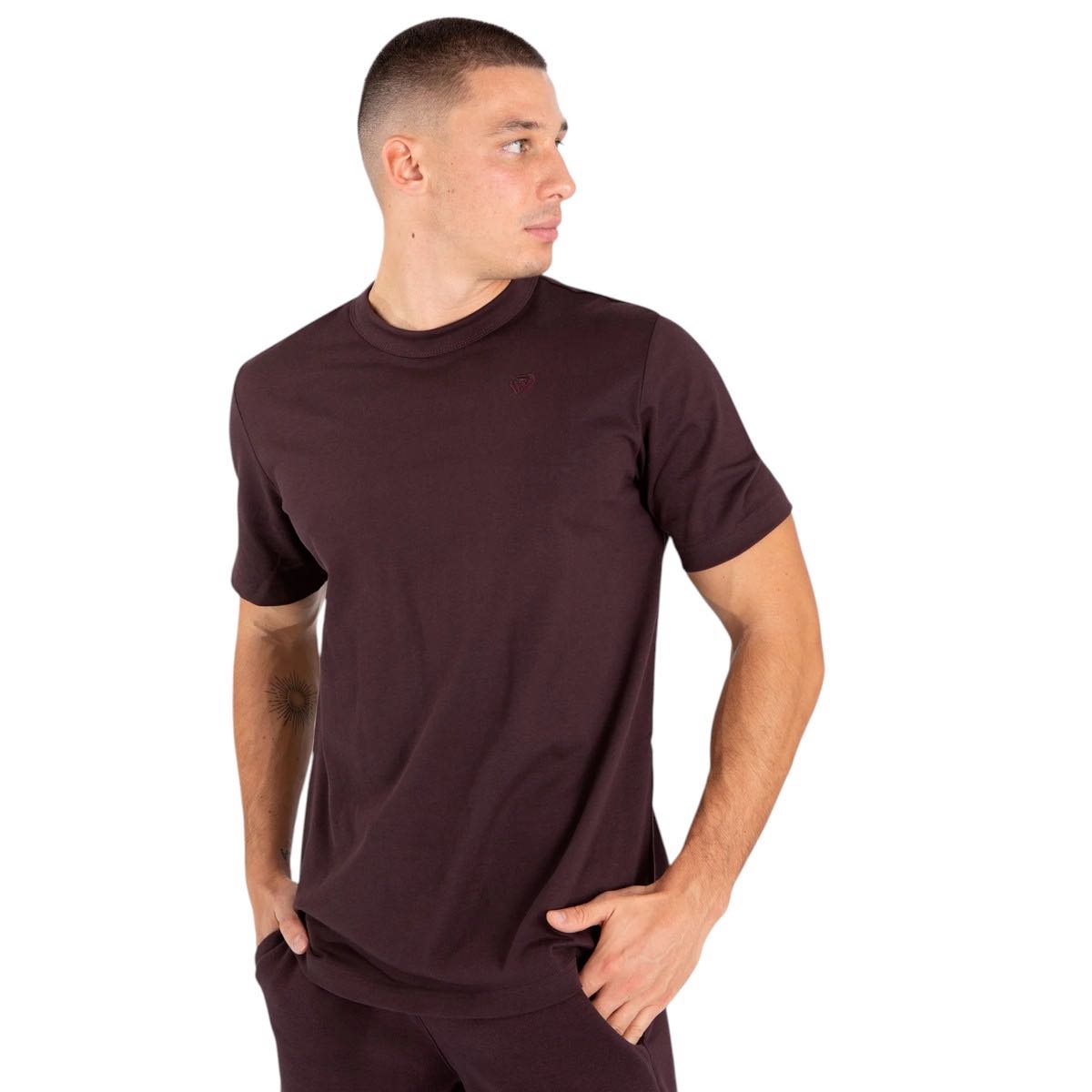 Man wearing maroon Venum Silent Power short-sleeve crew neck t-shirt with subtle tonal logo on chest
