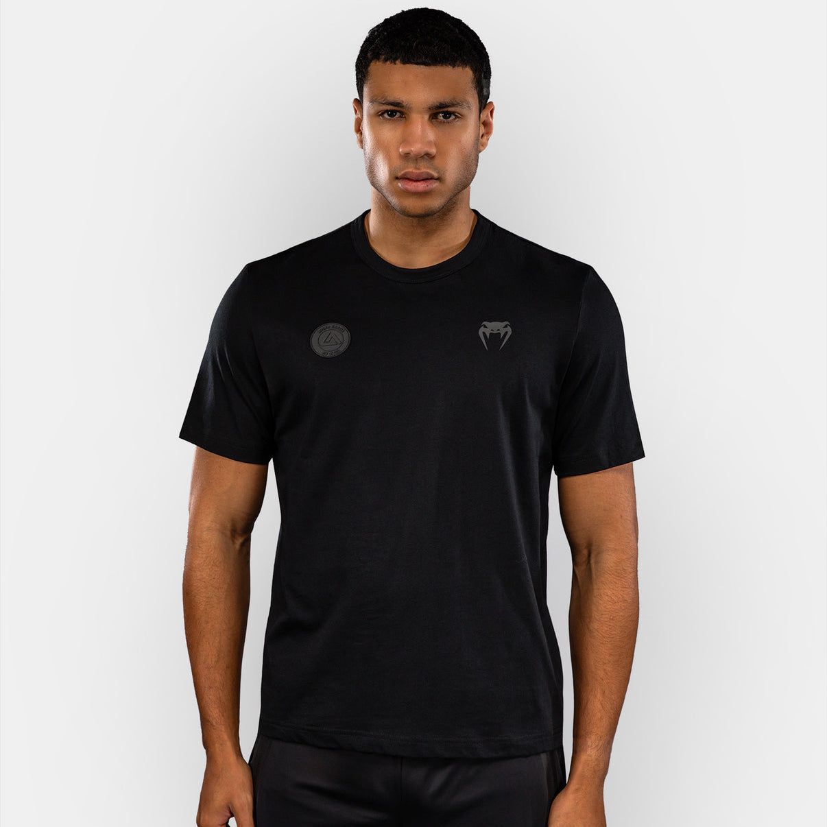 T-shirt Venum noir manches courtes en coton premium avec logo Roger Gracie Academy, style sport et jiu-jitsu brésilien