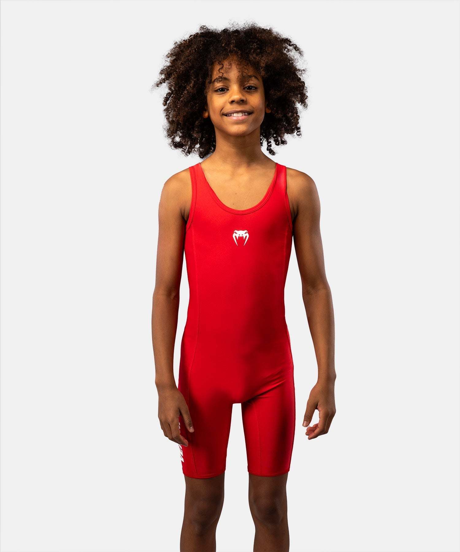 Tenue de lutte Venum enfant en tissu extensible, coupe athlétique et maintien optimal pour grappling et entraînement.