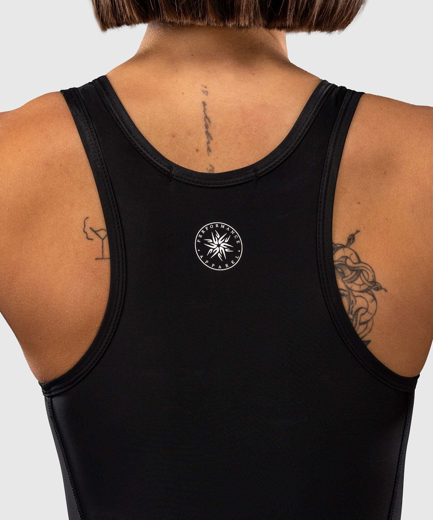 Tenue de lutte femme Venum noir élégante et performante