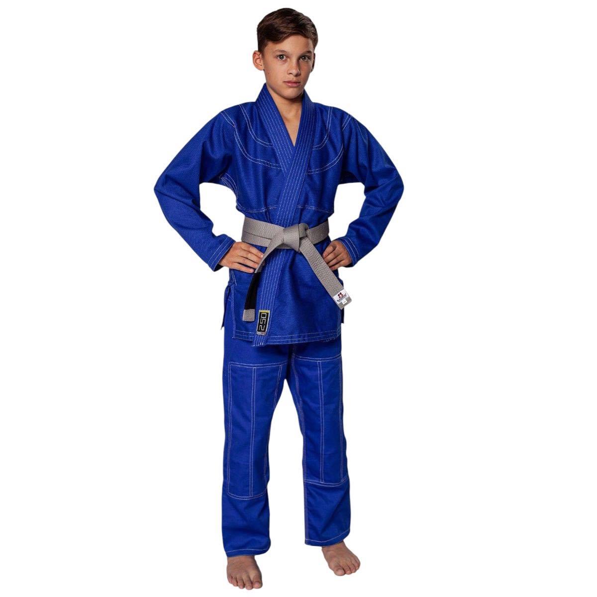 Child wearing blue Brazilian Jiu Jitsu gi with gray belt, Danrho brand