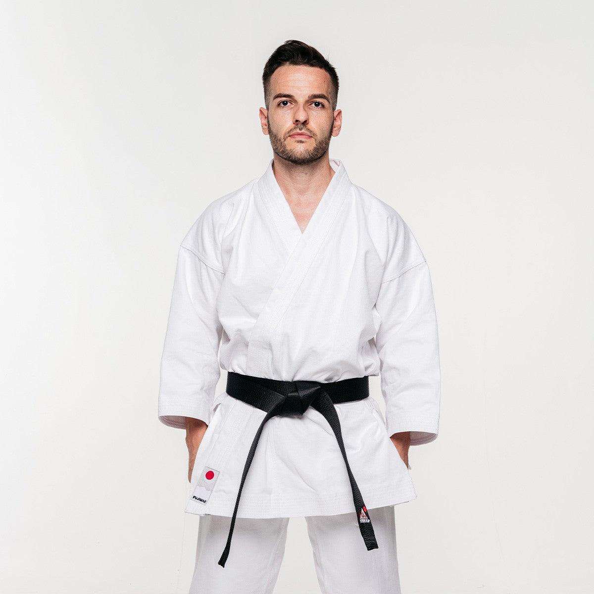 White Veste de Kimono karate jacket with black belt worn by male model