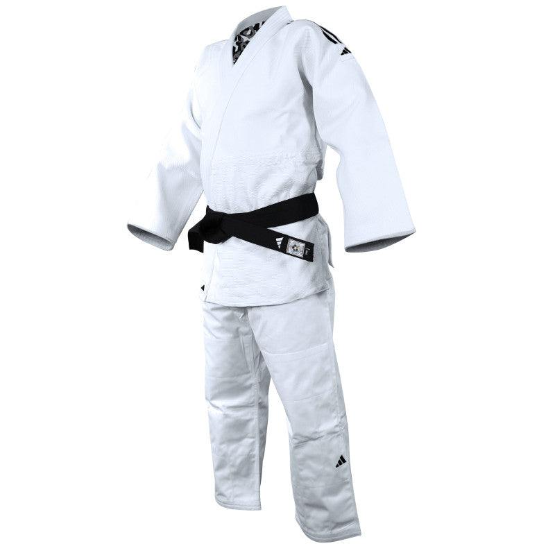 White Adidas J690 Quest judo kimono with black belt for training and competition, breathable polycotton fabric and reinforced design.