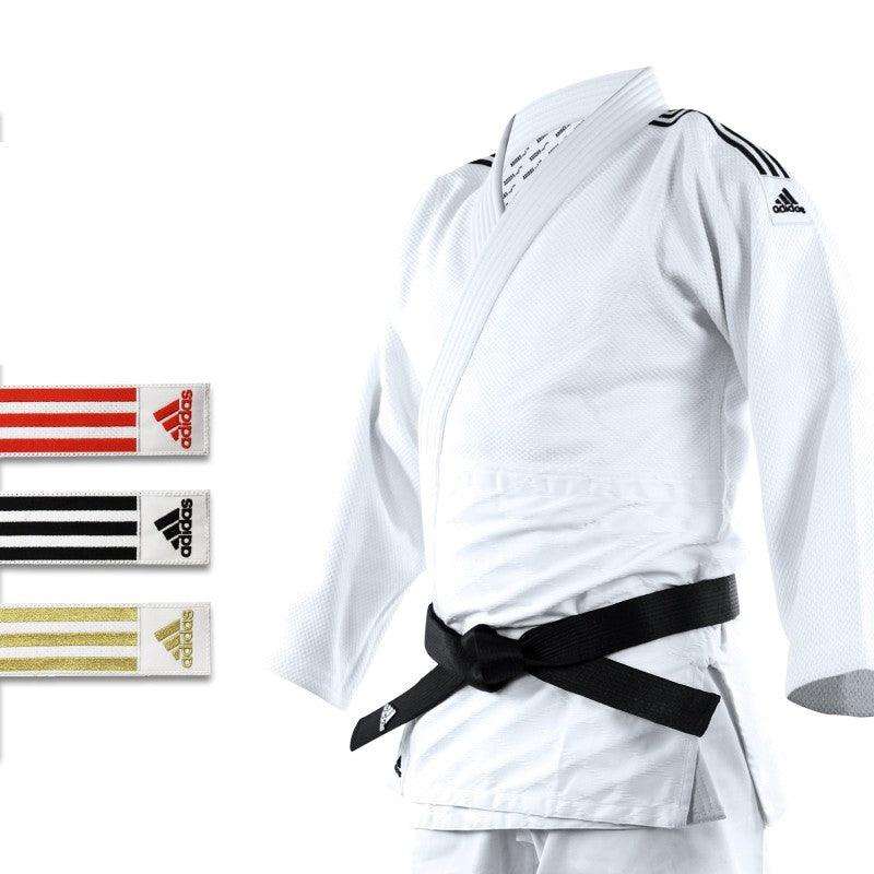 White Kimono de Judo Adidas J690 Quest with black belt and colored shoulder stripes in red, black, and gold variations for judo training and competition.