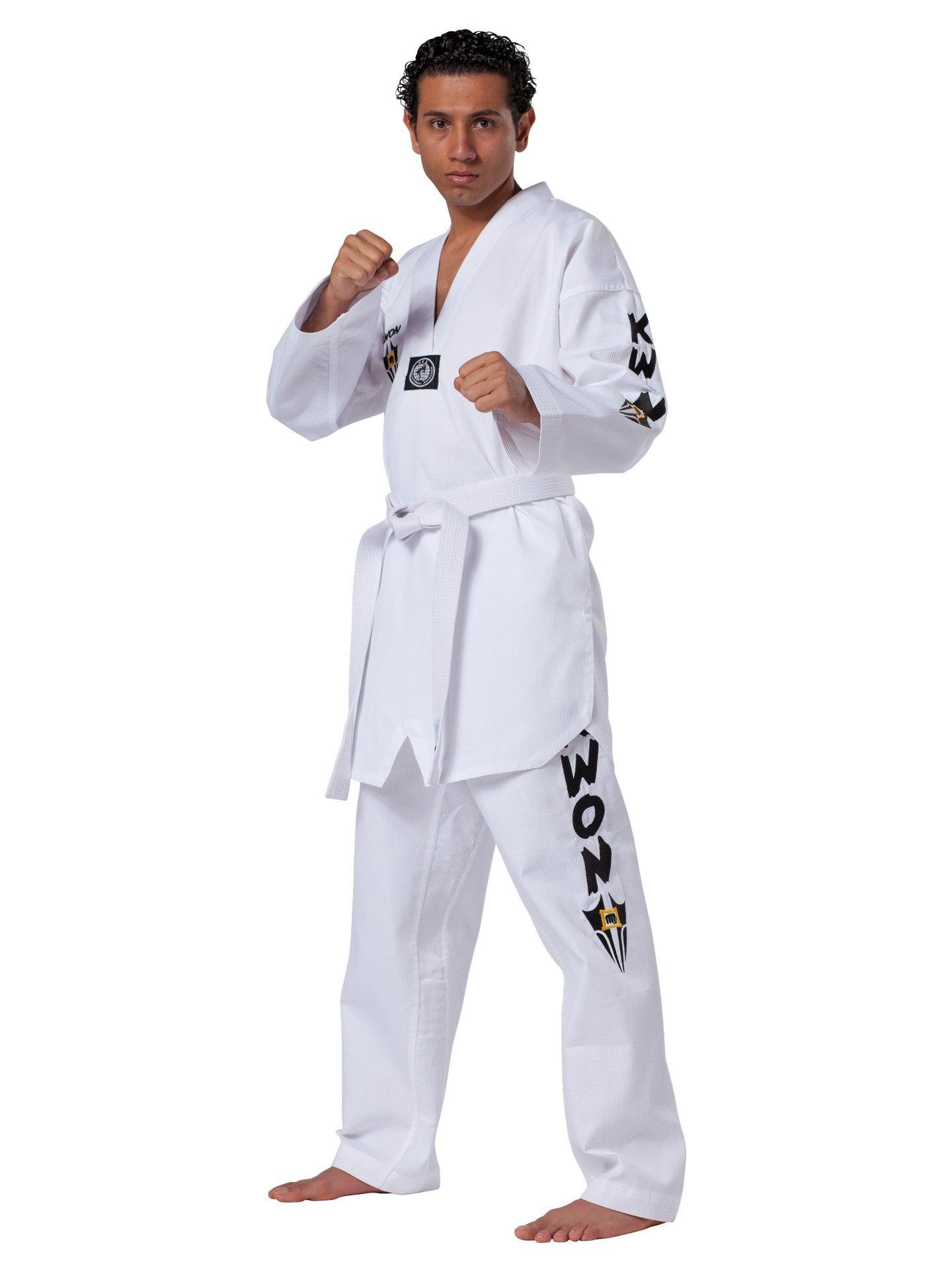 Man wearing white Starfighter Kwon Taekwondo dobok with long, loose jacket and pants, standing in fighting stance