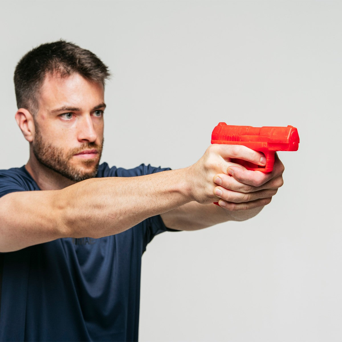 Pistolet d'entraînement rouge FUJIMAE SD-W97 vu de profil