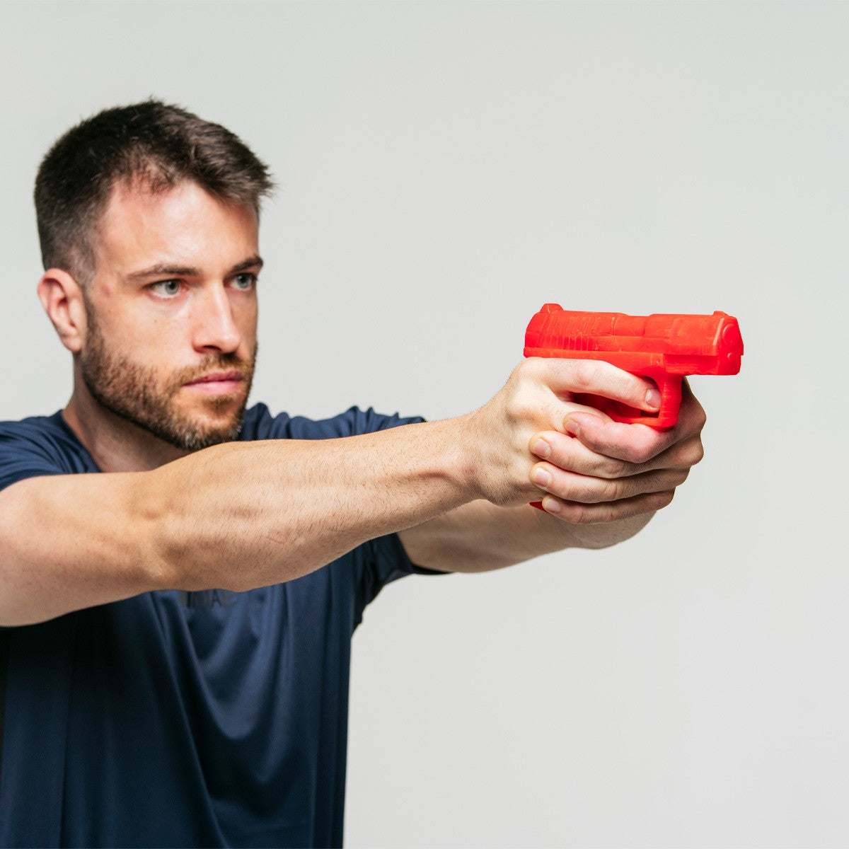 Pistolet d'entraînement rouge FUJIMAE SD-W97 vu de profil