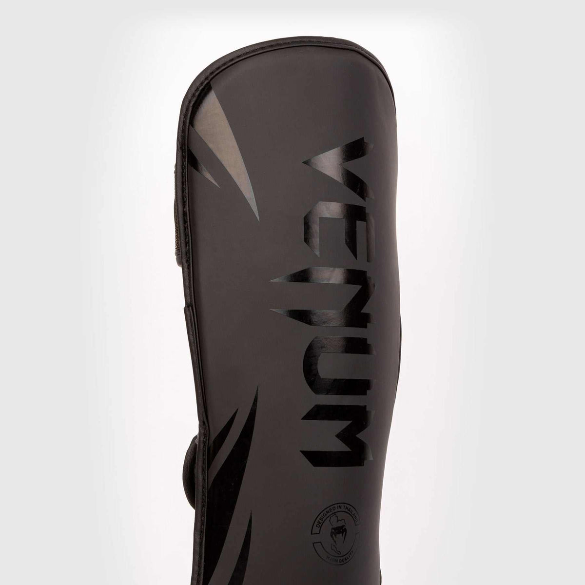 Protège-tibias enfant Venum Challenger noir pour boxe pieds-poings avec mousse haute densité et maintien velcro