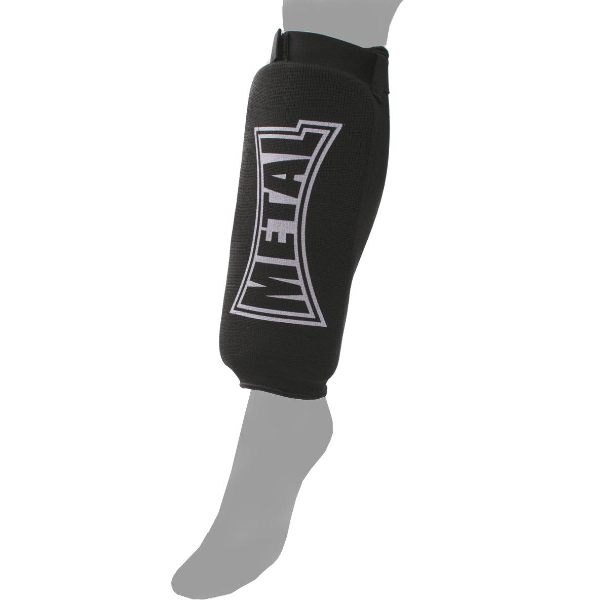 Black Metal Boxe sock-style shin guard with EVA foam padding for combat sports protection