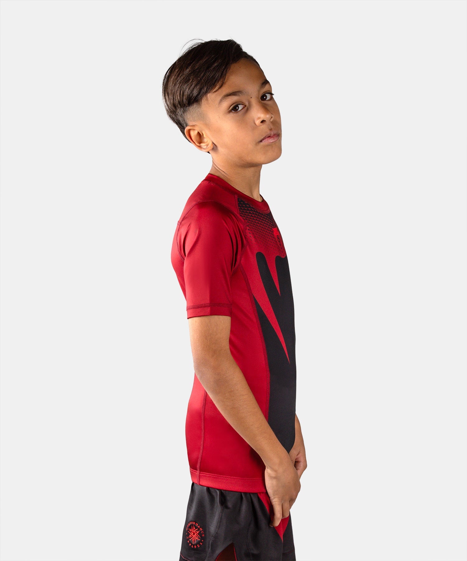 Rashguard manches courtes enfant Venum Attack Noir/Rouge pour l'entraînement