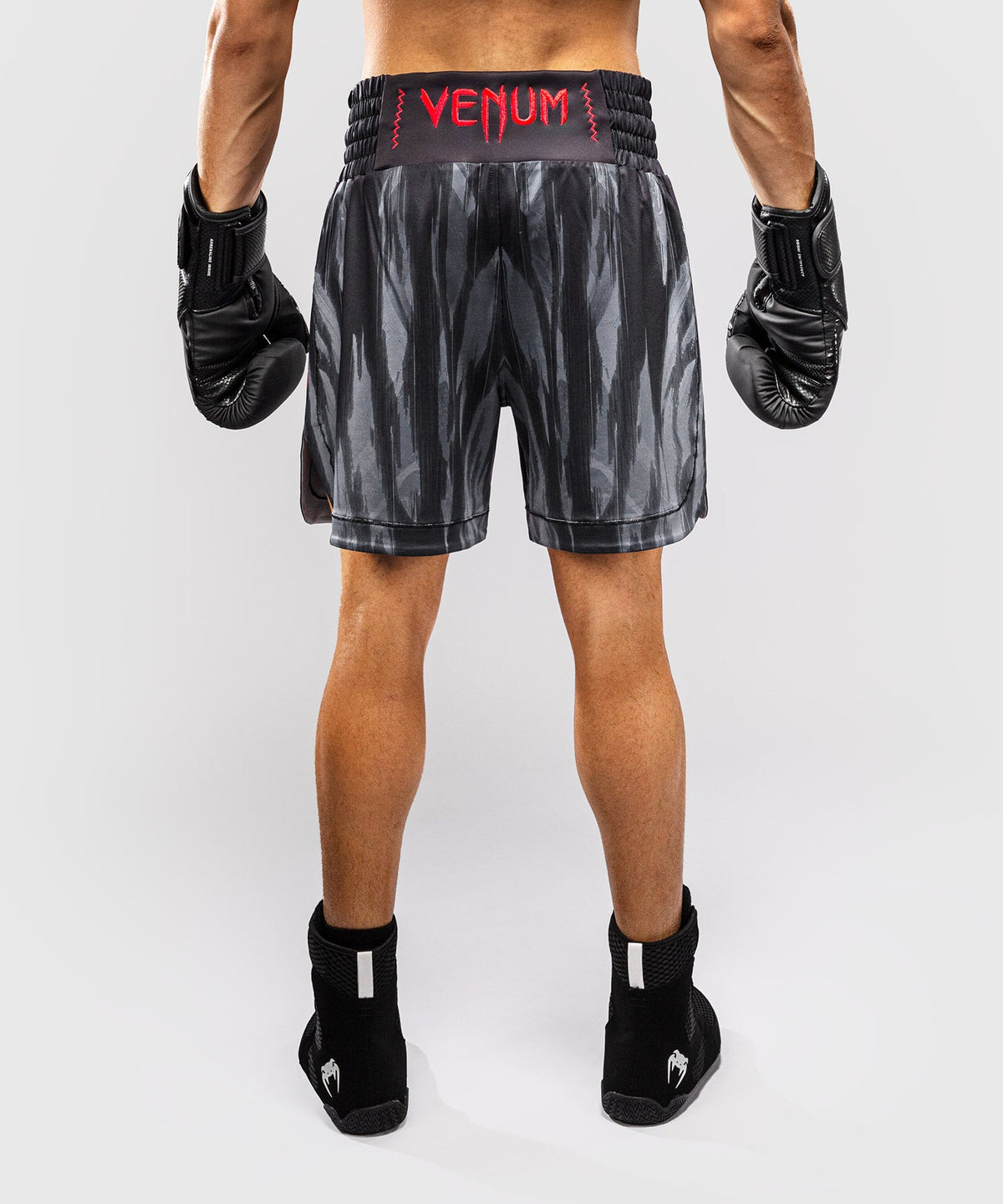 Short de Boxe Venum Demon Noir/Gris disponible à la Boutique des Arts Martiaux