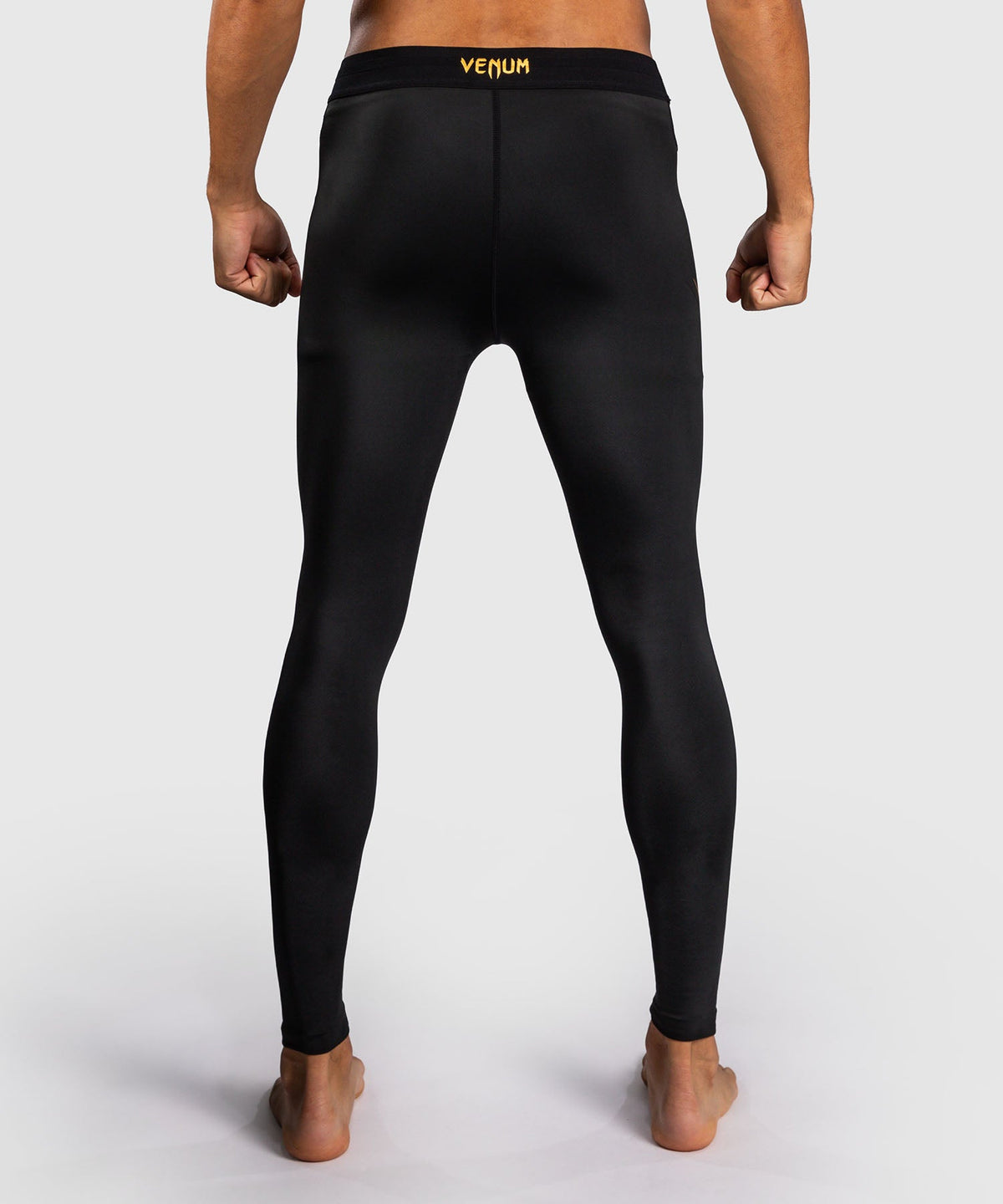 Spats Venum G-Core Noir/Or disponible à la Boutique des Arts Martiaux