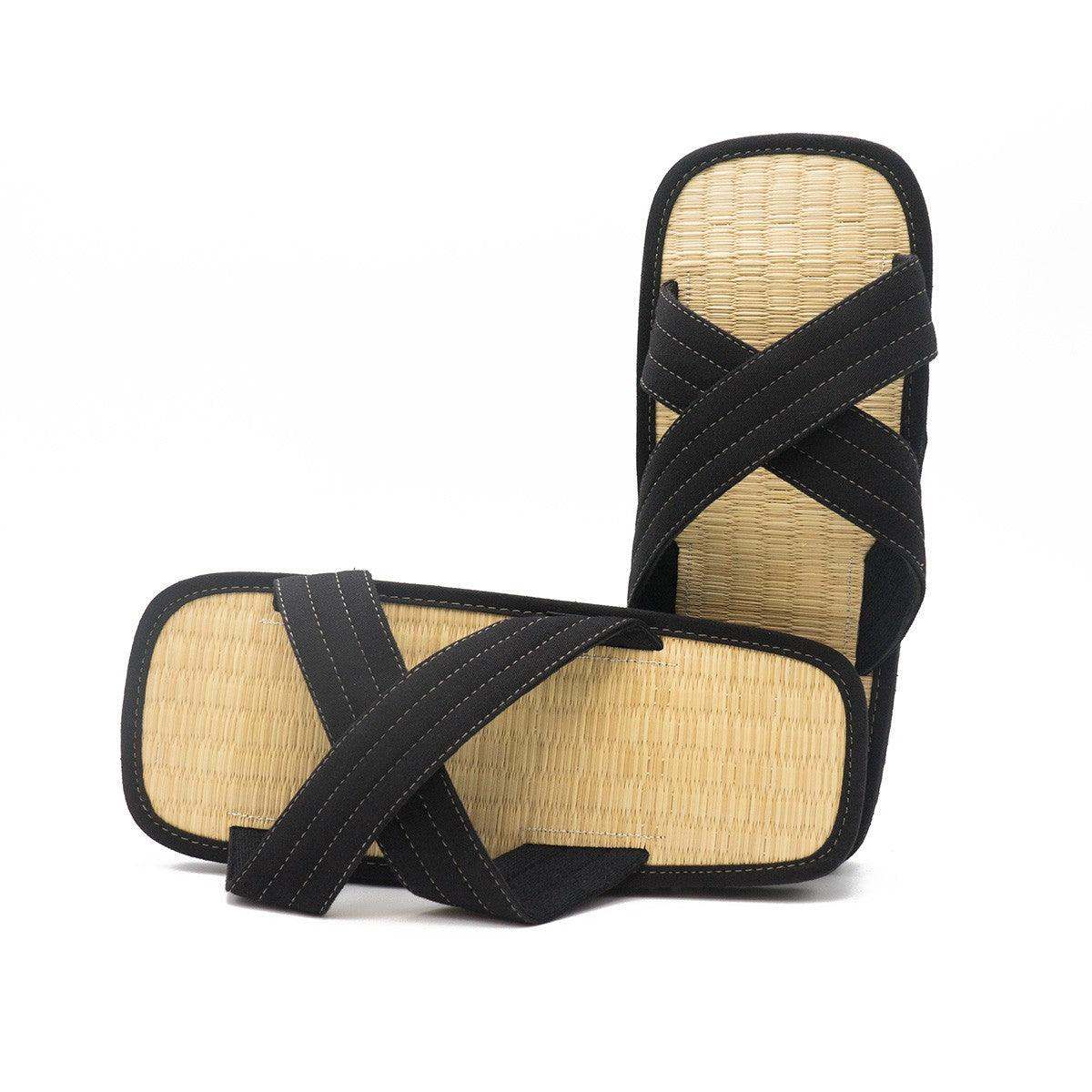 Pair of Zori FUJIMAE traditional tatami sandals with black X-shaped straps and natural rice straw soles.