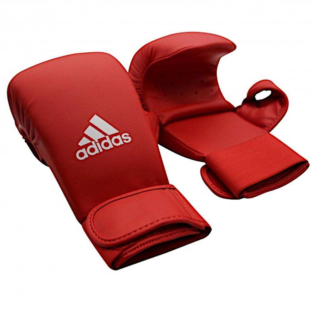 Red Adidas Adidas FFKaraté integrated karate mitts with thumb, padded with EVA foam and triple-layer shock absorption, featuring Velcro closure for secure fit.