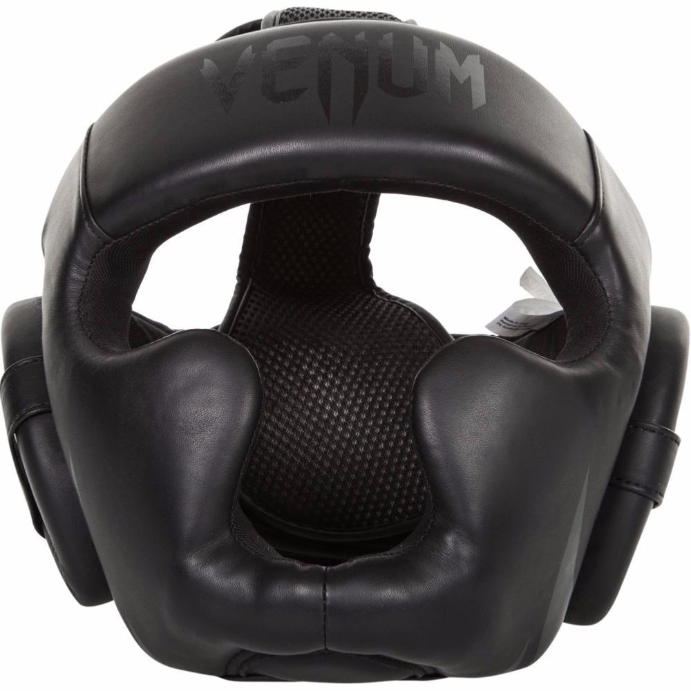 Black Venum Challenger 2.0 boxing headgear made of synthetic leather with triple-density foam and Velcro straps for secure fit and optimal protection