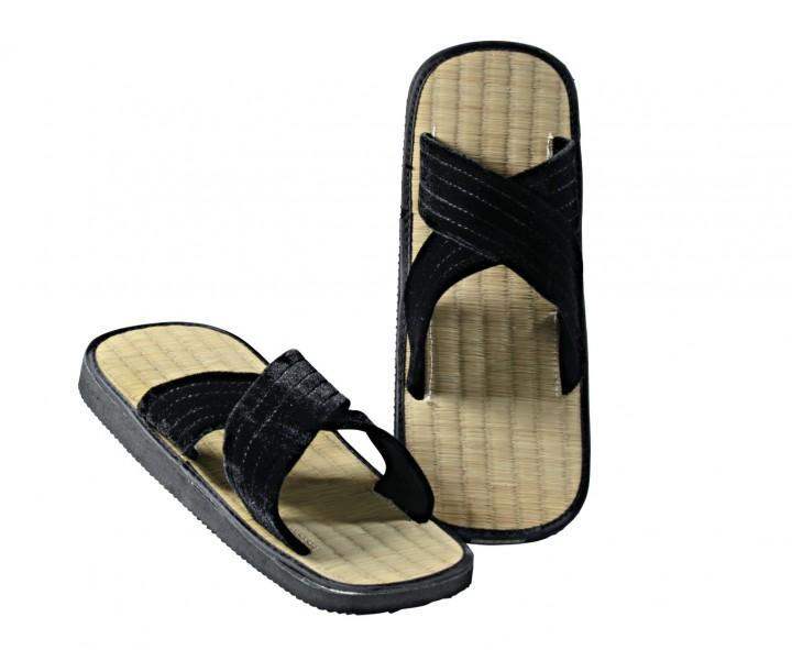 Zori Kwon sandals with crossed X-shaped black straps and rice straw footbed for comfort and grip