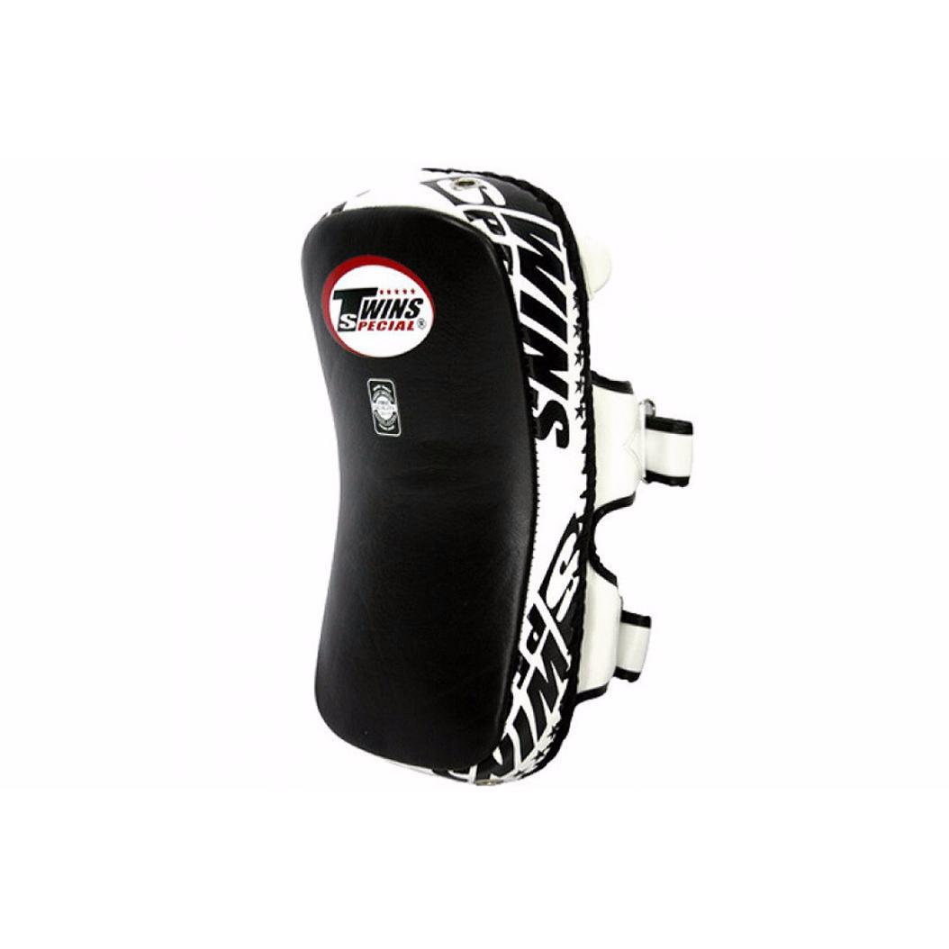 Black curved Twins Special Thai boxing pao pad made of premium leather with high-density foam and velcro straps for intensive training.