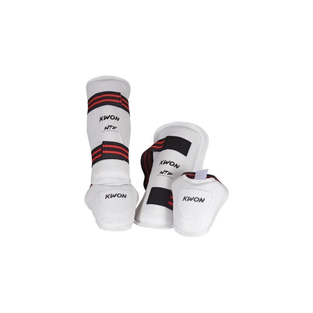 White and black Kwon WT Taekwondo shin and foot guards with adjustable straps and removable foot protection for training and competition